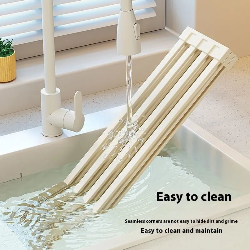 Foldable milky white 304 stainless steel kitchen draining rack showing collapsed and expanded positions