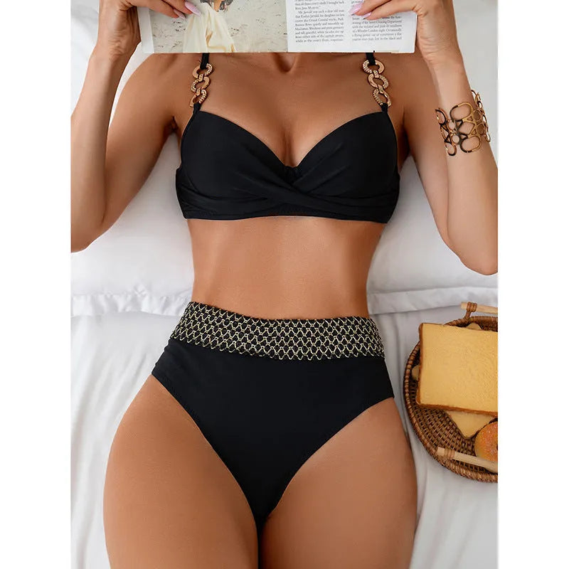 Black European and American style bikini swimsuit briefs set with sleeveless top on a mannequin.
