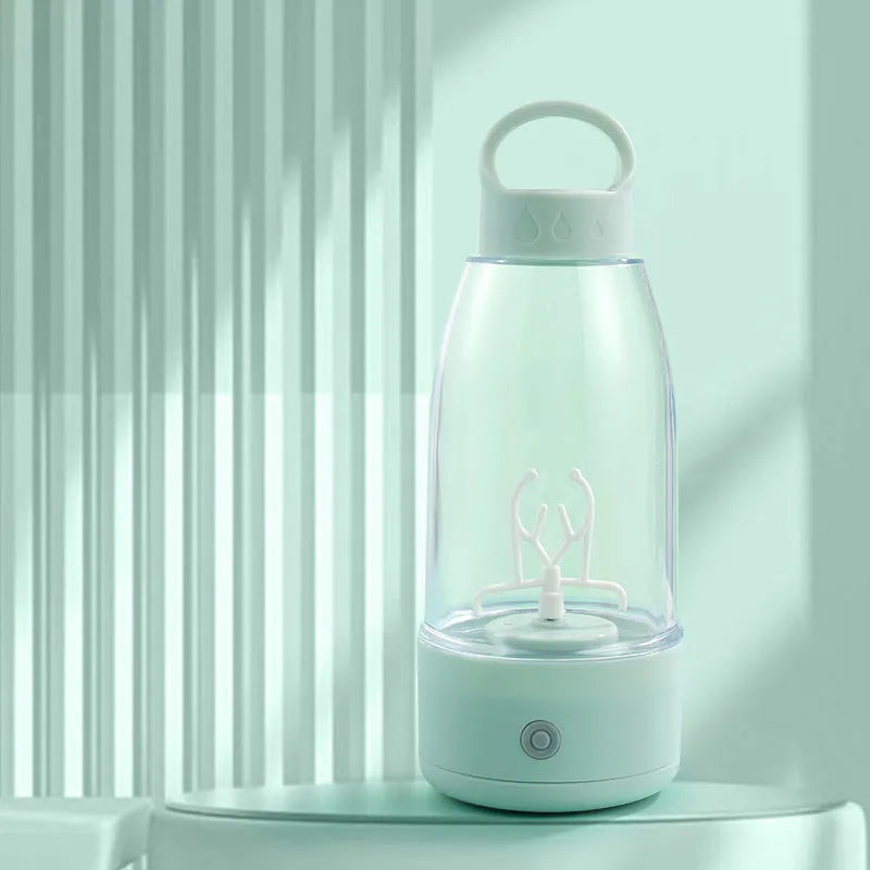 Automatic electric shaker bottle with USB port, handle, and blending motor in green, pink or white.