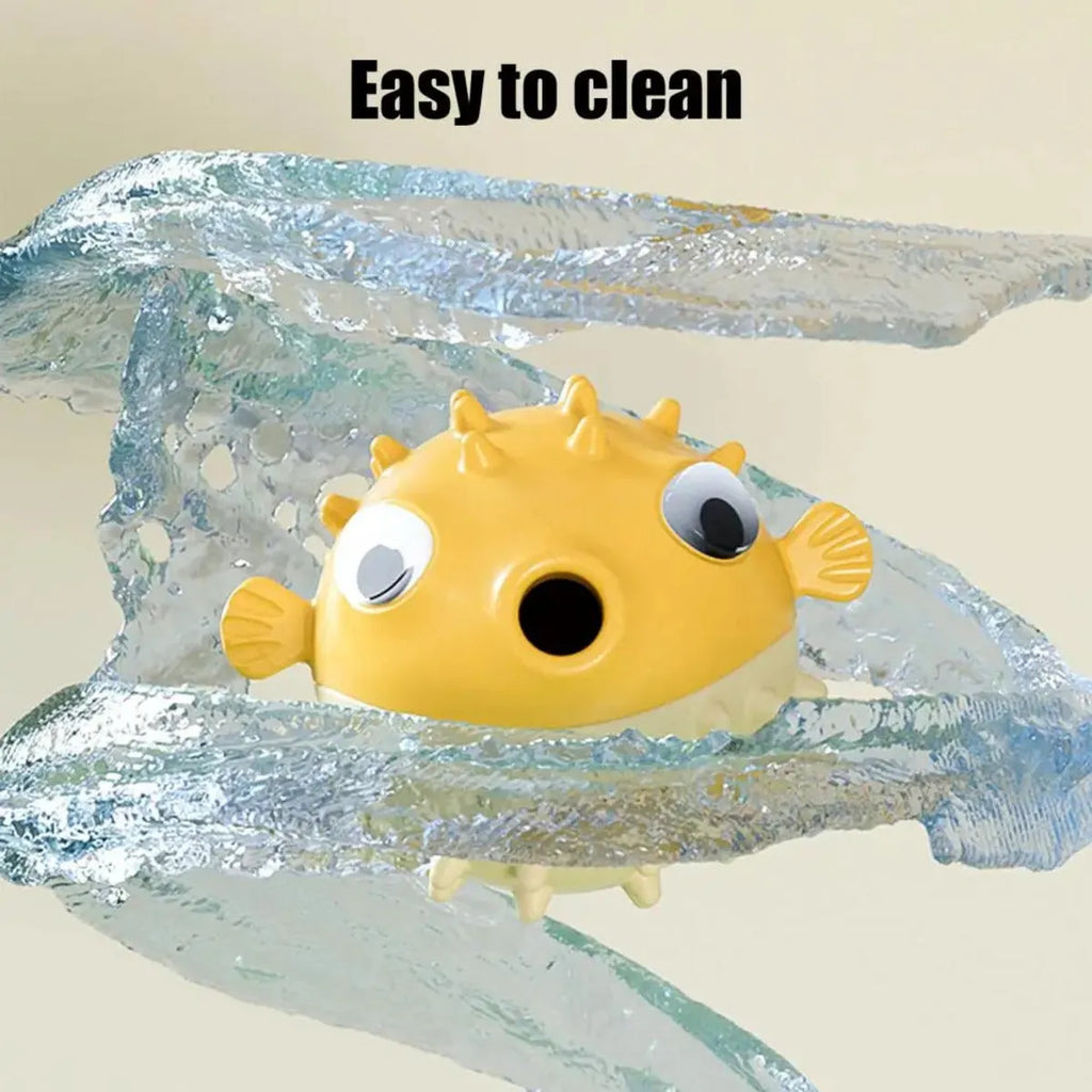 Yellow fish-shaped vinyl dog chew toy with textured surface for teeth cleaning