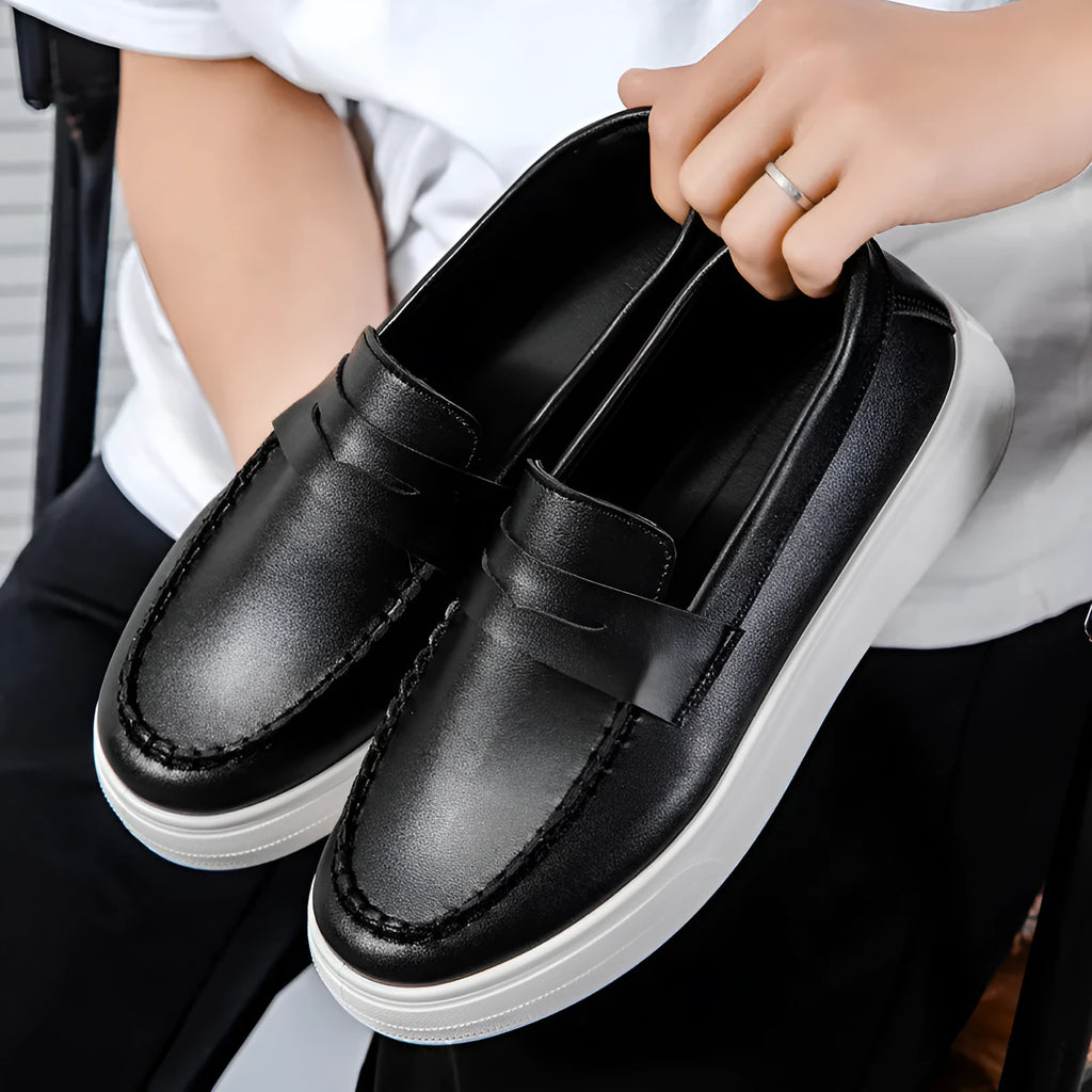 Men's casual slip-on loafers in PU leather with round toe, shown in black and white colour
