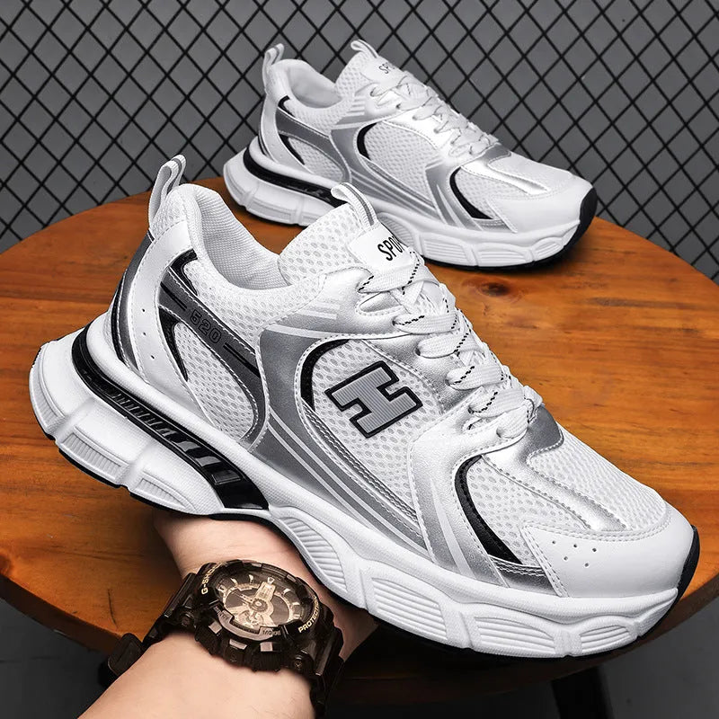 Men's mesh casual running shoes in black, white orange, and white grey with round toe and plastic soles