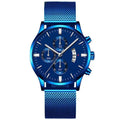 Men's stainless steel mesh band quartz watch showing analogue face and decorative subdial.