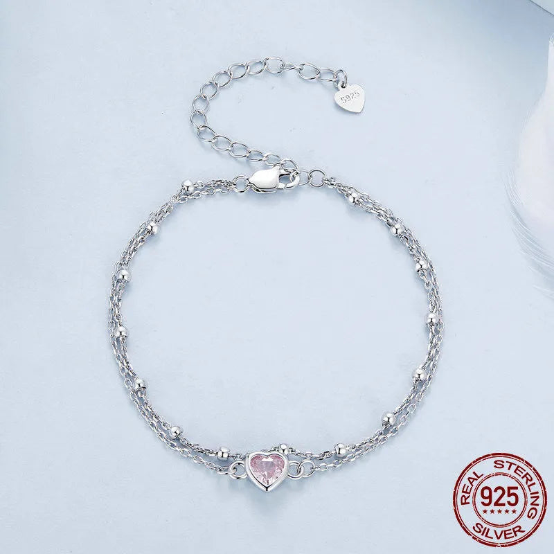Women's 925 sterling silver bracelet with heart-shaped pendant on adjustable chain