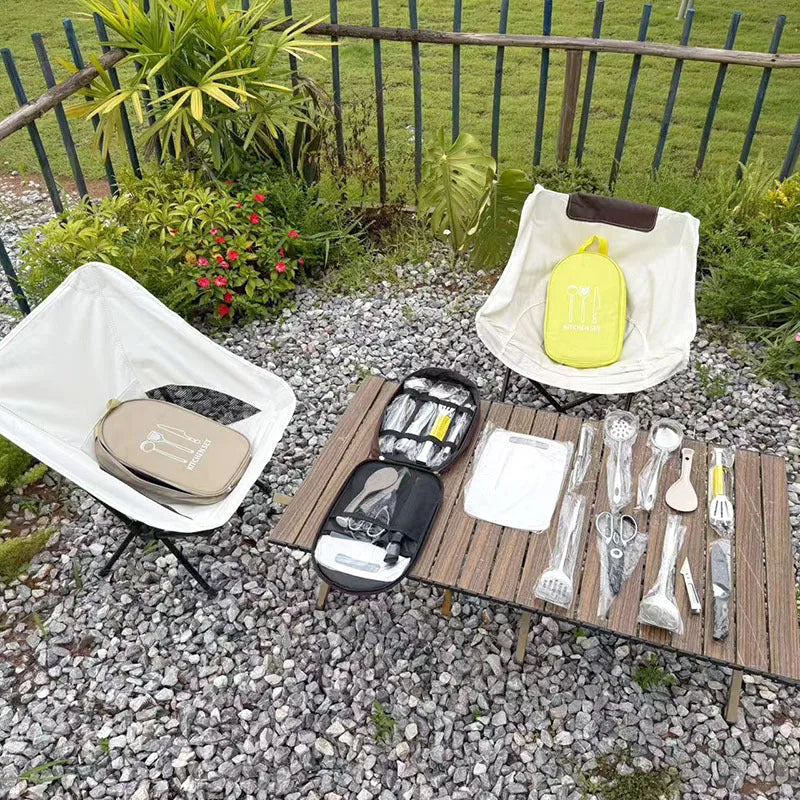 Portable picnic kitchenware storage bag containing stainless steel cutlery set for twelve persons