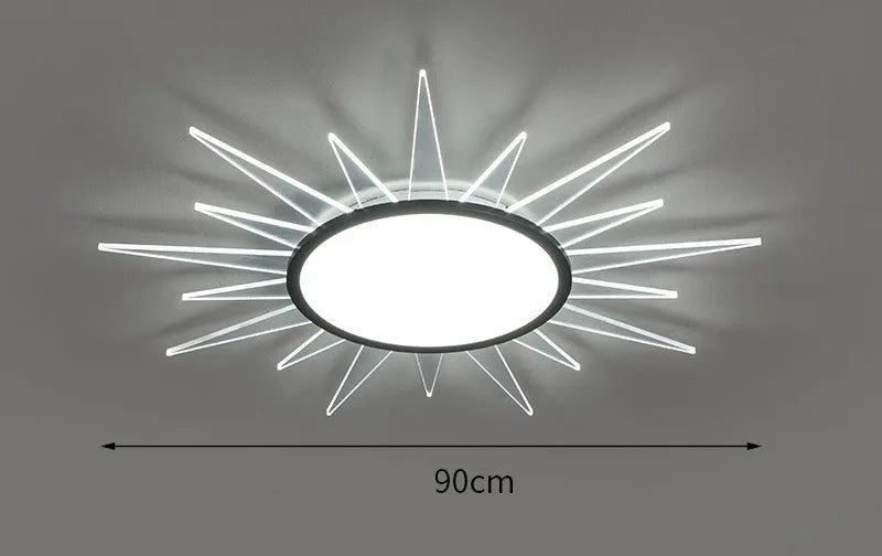 Modern circular aluminium LED ceiling lamp with remote control shown in room setting