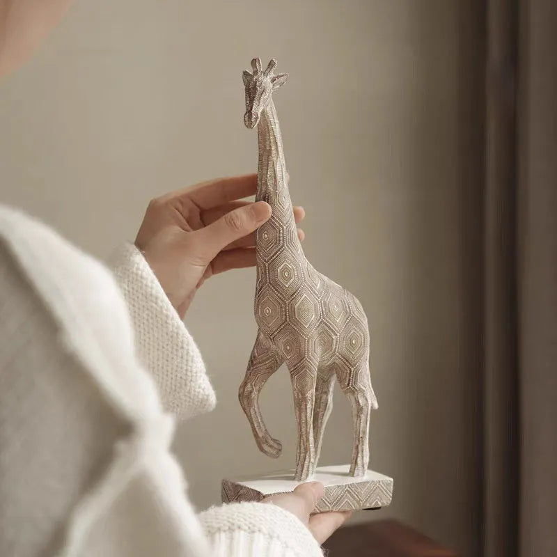 Wood colour European style giraffe resin ornament on a shelf for decorative display.