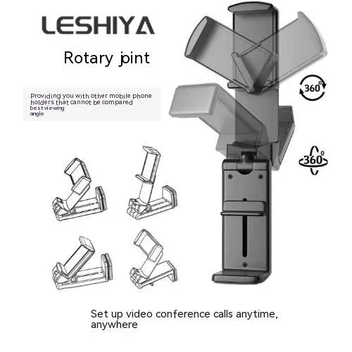 Black foldable rotating phone stand holding a mobile phone in landscape orientation on a desk.