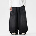 Men's plus size baggy jeans in dark blue denim with a straight leg opening and low waist.