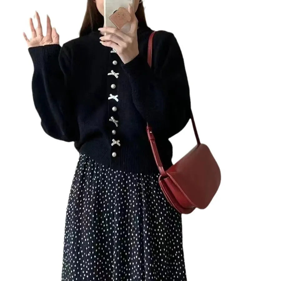 Women's solid colour cardigan with pearl buttons and bow pattern detail on cashmere-style fabric