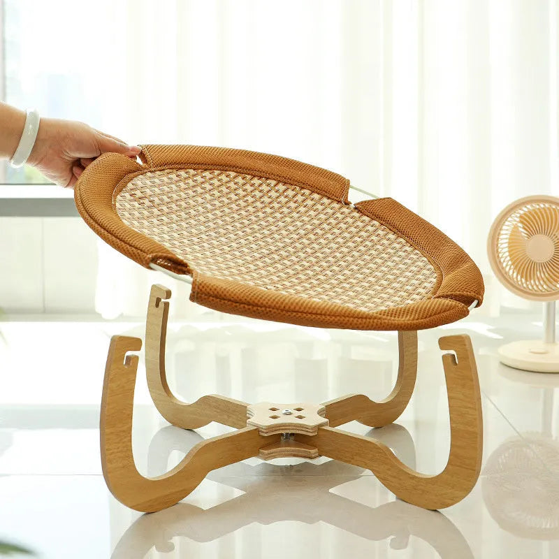 Brown woven rattan pet hammock bed measuring 46cm square with 17.5cm height elevation