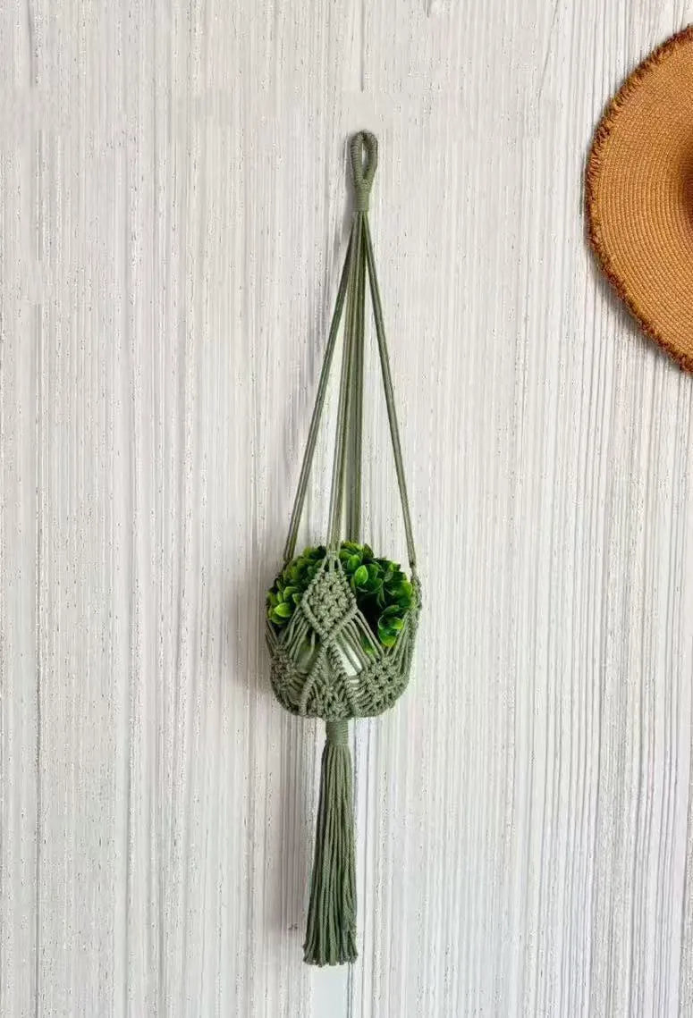Hand-woven polyester cotton flower pot in brown colour displaying textured weave pattern
