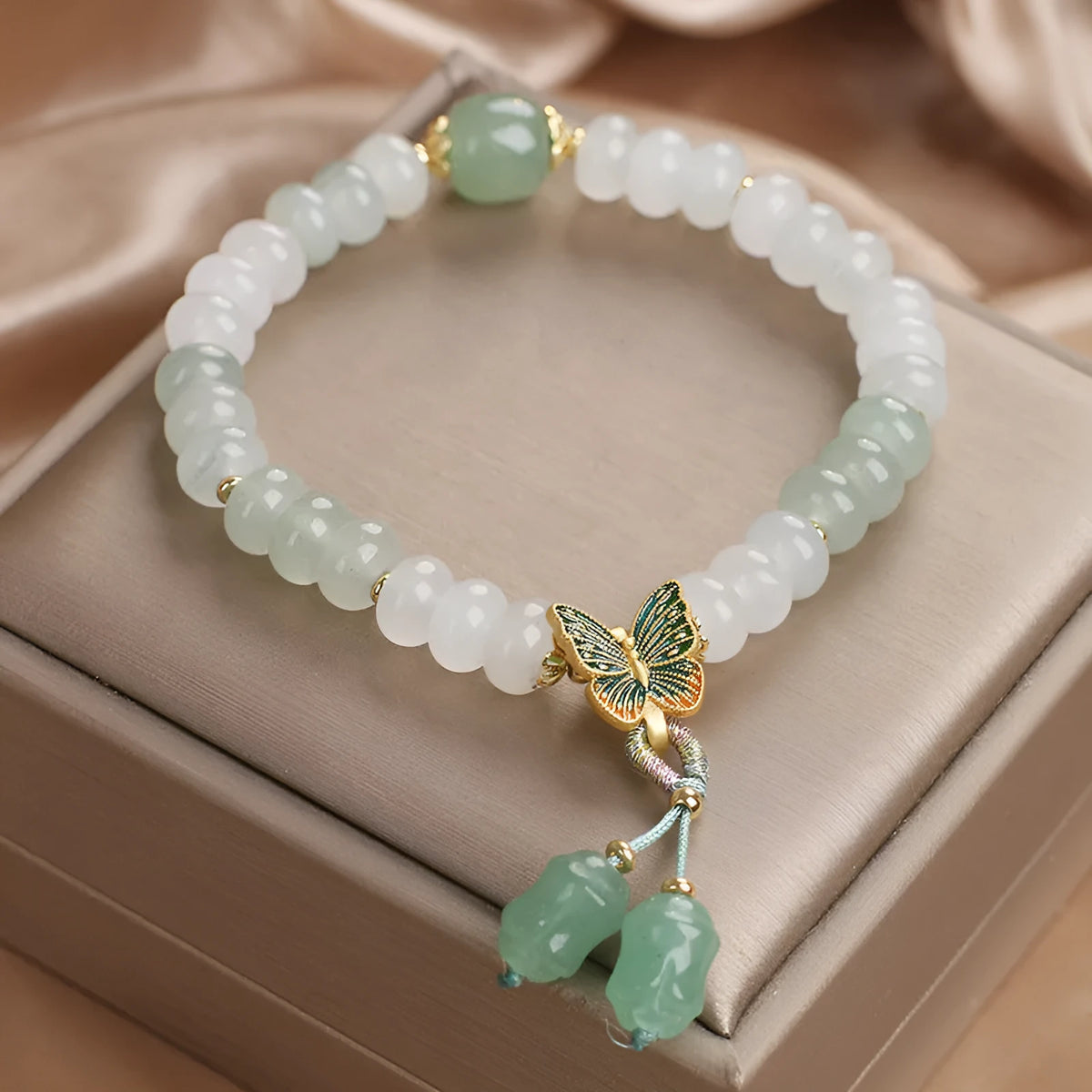 Green Tian Shan Cui abacus bead bracelet with crystal stones and retro butterfly charm tassel
