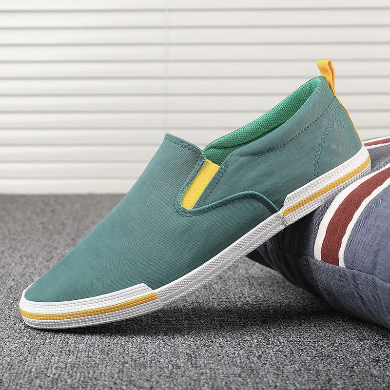 Men's low top canvas casual shoes with rubber vulcanised sole in grey, black orange, or khaki