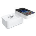 White multi USB port fast charger with wireless charging pad and international plug adapters