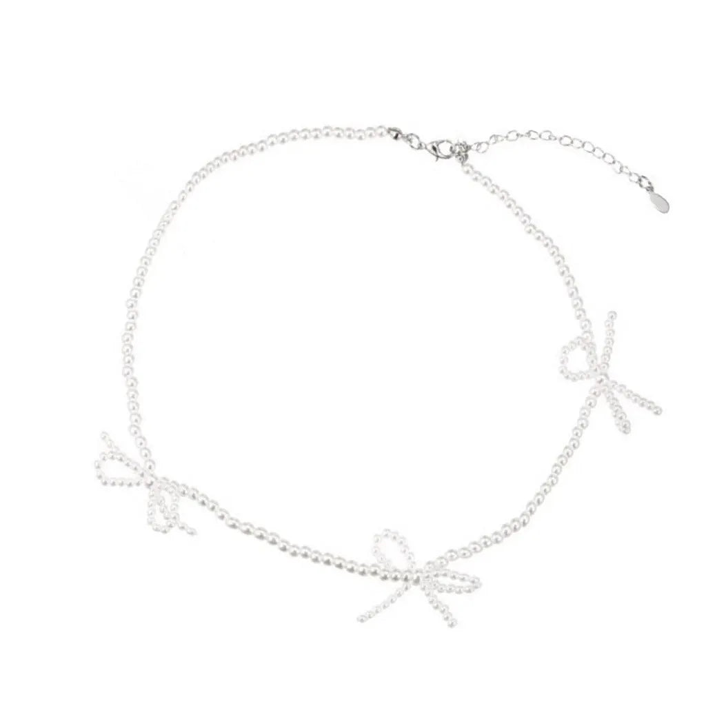 White sweet bow pearl necklace with geometric design on adjustable 31-40cm clavicle chain