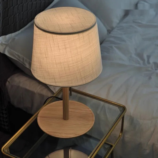 Walnut colour solid wood bedside lamp with cloth shade and cable switch