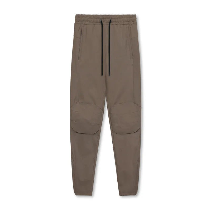 Men's grey quick-dry running pants with ankle-tied cuffs for fitness workouts