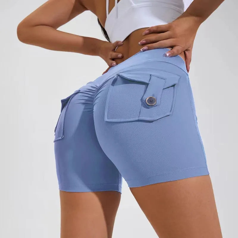 Women's high-waist fitness shorts in quick-dry nylon with side pockets, shown in Electric Blue.