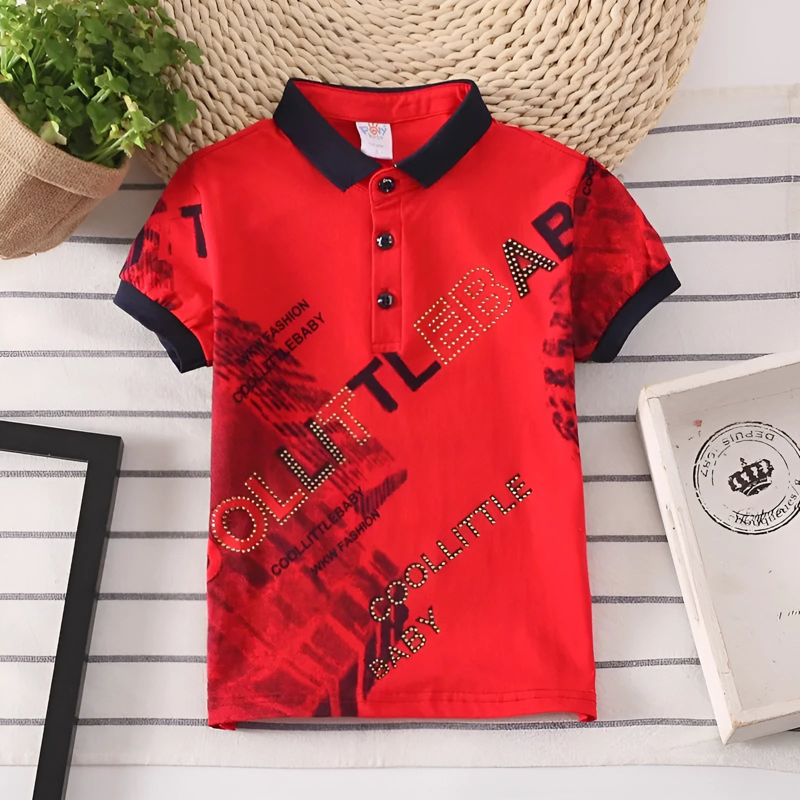 Boys' red cotton short sleeve t-shirt with a lapel collar on a hanger.