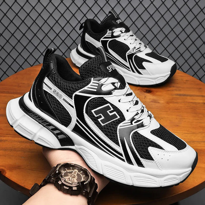 Men's mesh casual running shoes in black, white orange, and white grey with round toe and plastic soles