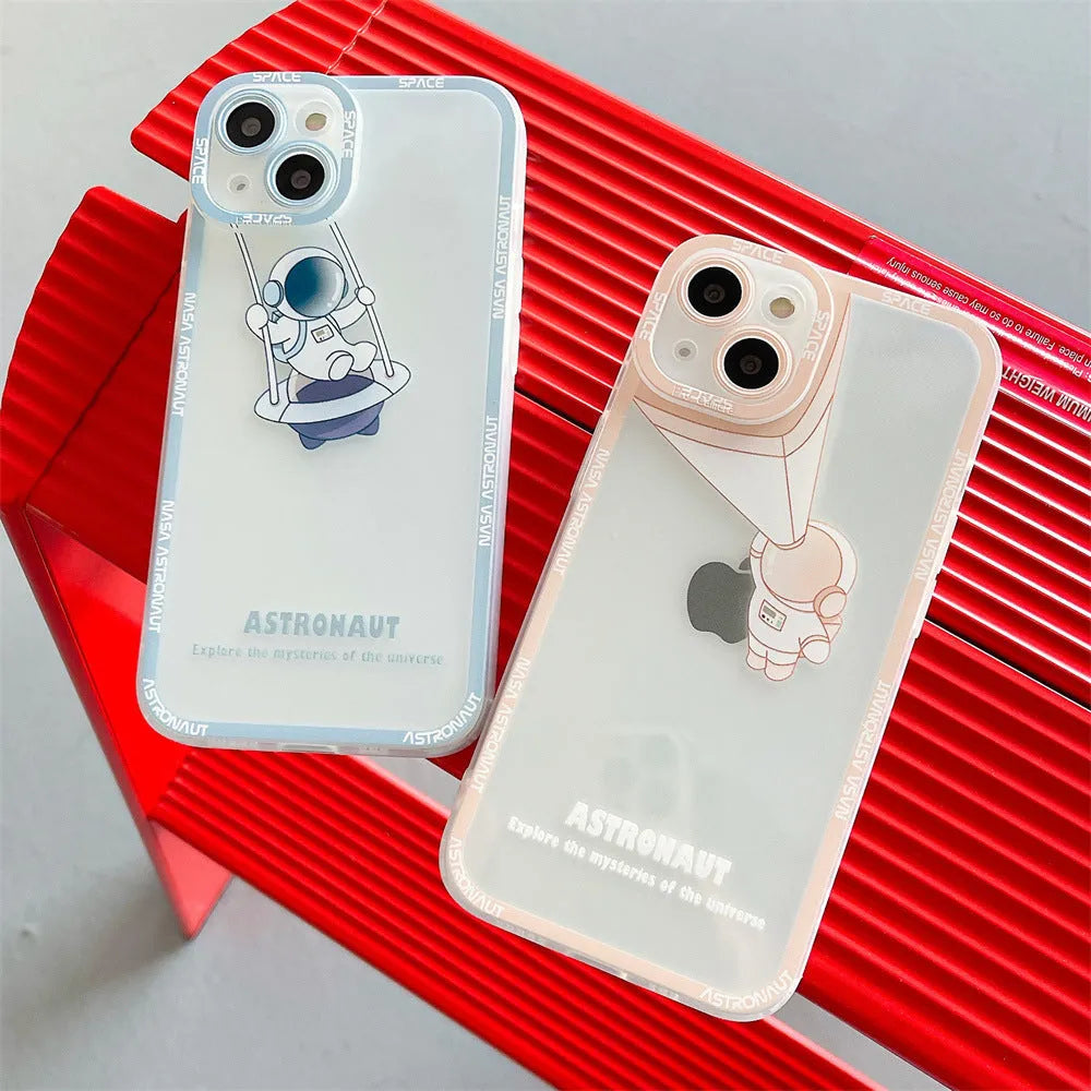 Silicone transparent iPhone case with astronaut print in black, blue, and pink colours