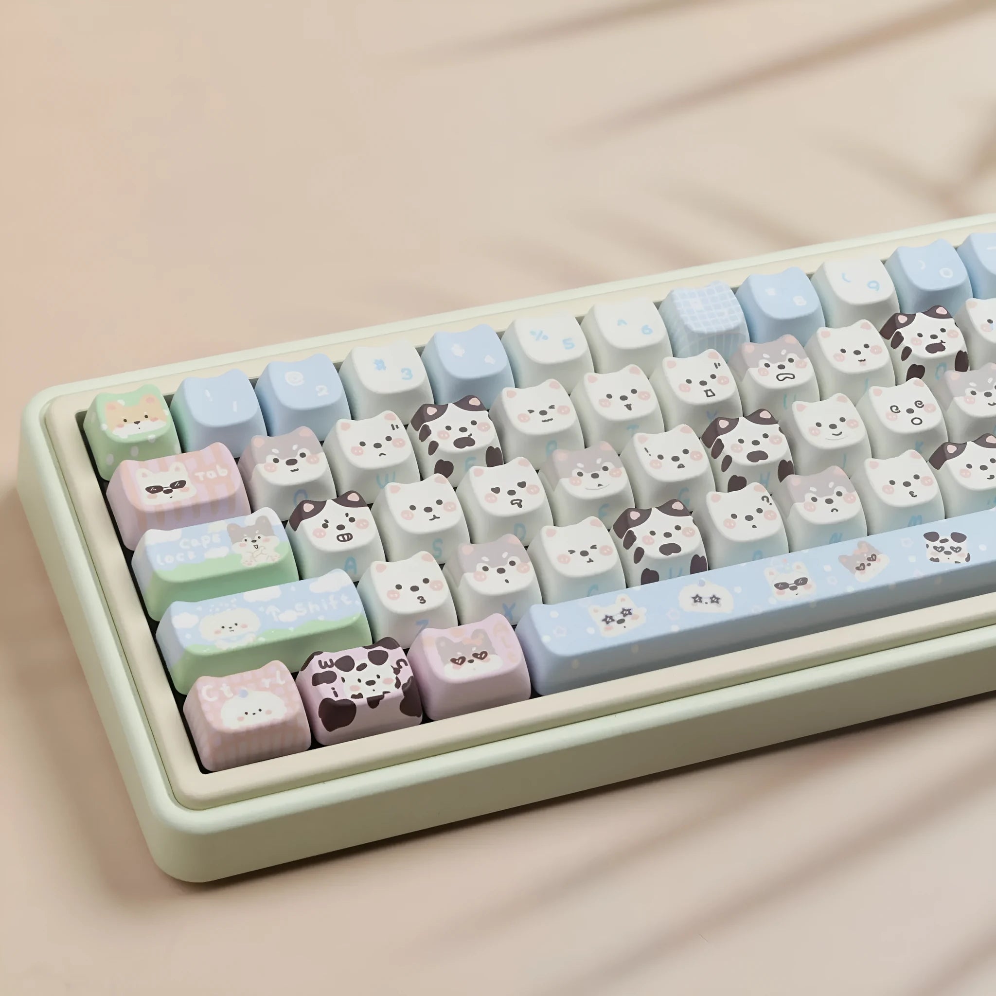 PBT sublimation keycap set showing detailed puppy and cat designs on mechanical keyboard keys