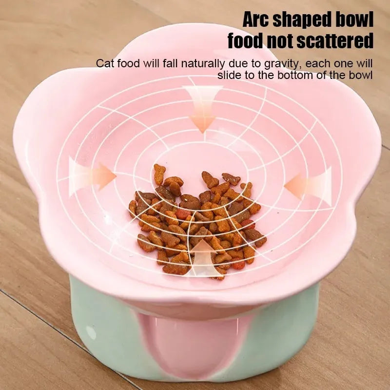 Blue ceramic raised pet bowl with floral pattern and non-slip base for cats and small dogs