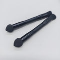 Double-headed makeup brush with miter sponge tip and artificial fibre bristles on wooden handle