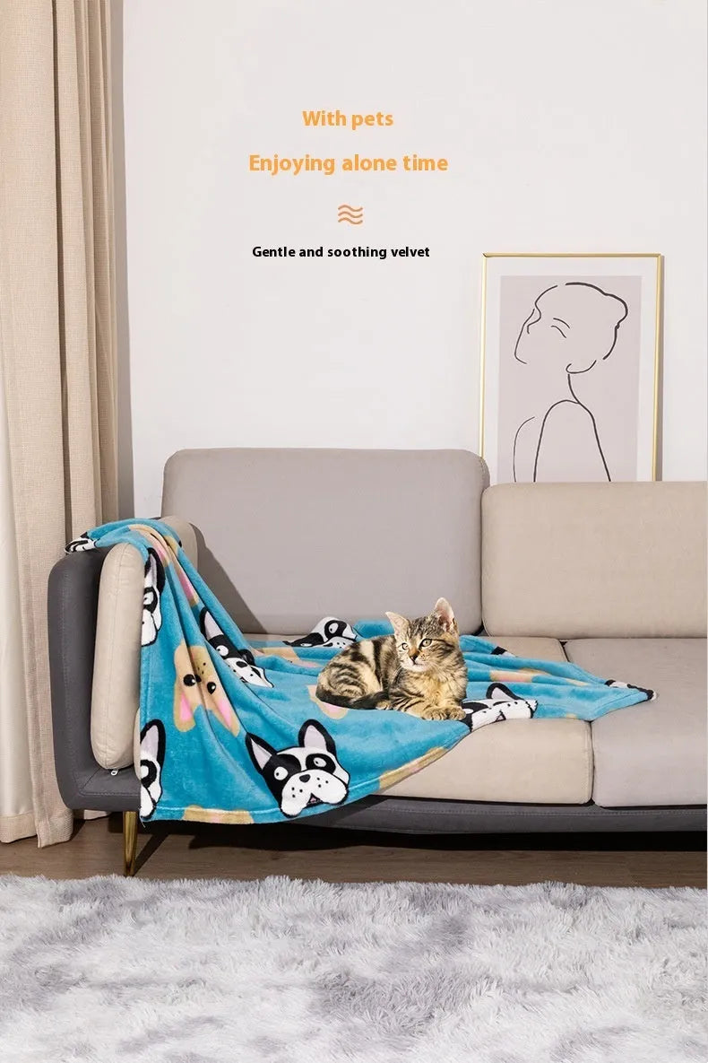 Blue cartoon dog print double-sided flannel pet blanket laid flat.