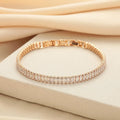 Women's brass bracelet with zircon inlaid geometric quadrilateral design in champagne gold finish