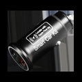Black car charger GPS locator tracking device for vehicle security on a grey background.