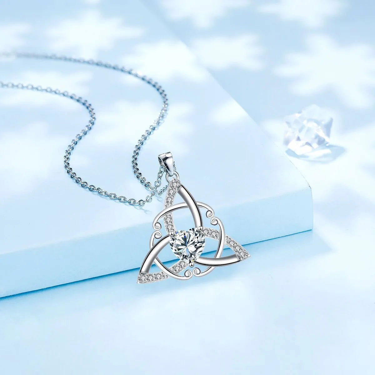Geometric Celtic knot copper necklace for women showing electroplated finish in available colour options