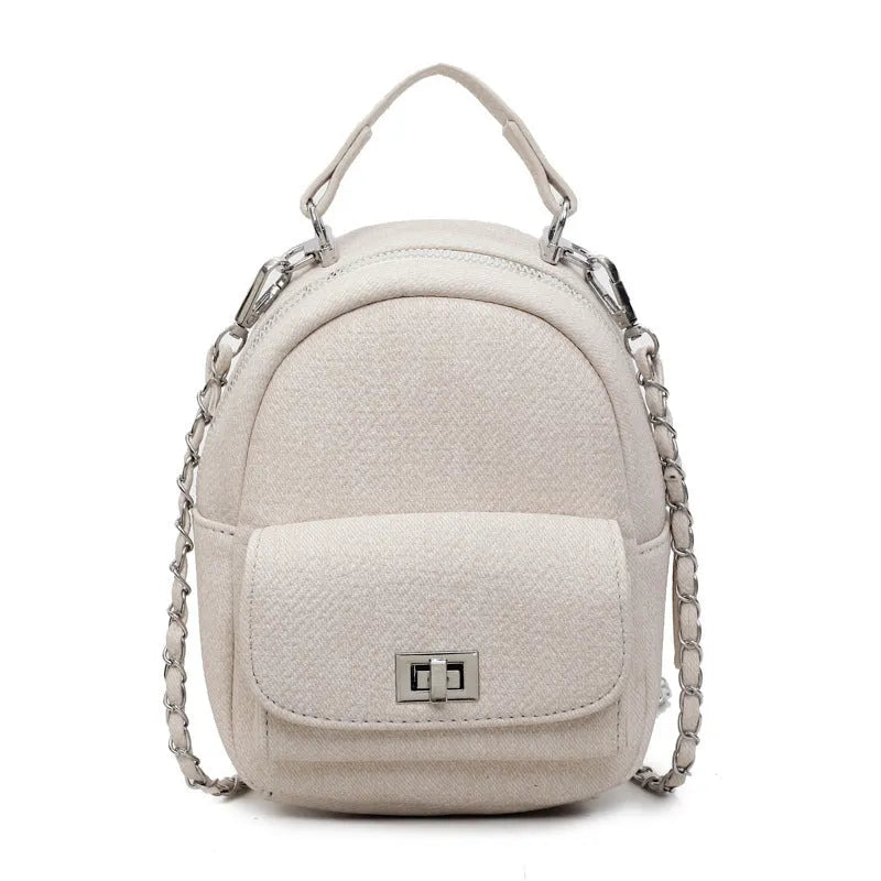 Korean style solid colour PU backpack with three-dimensional pocket, available in black, beige, blue, dark blue and khaki.