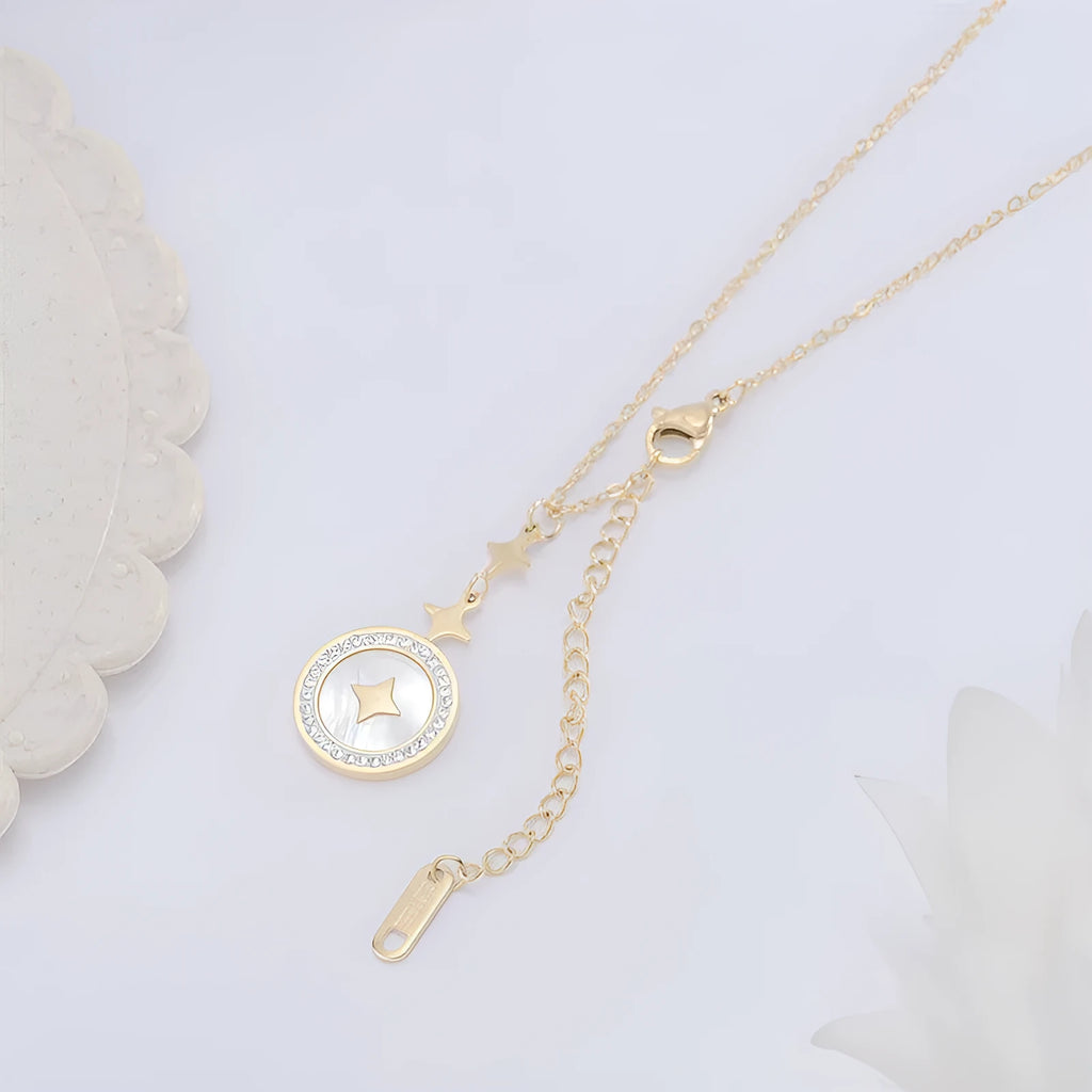 Gold titanium steel necklace with a geometric six-pointed star pendant on an O-ring chain.