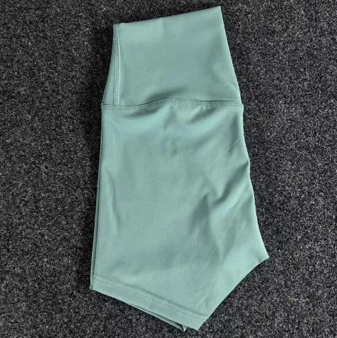Women's high waist yoga shorts in nylon fabric available in multiple colours and sizes