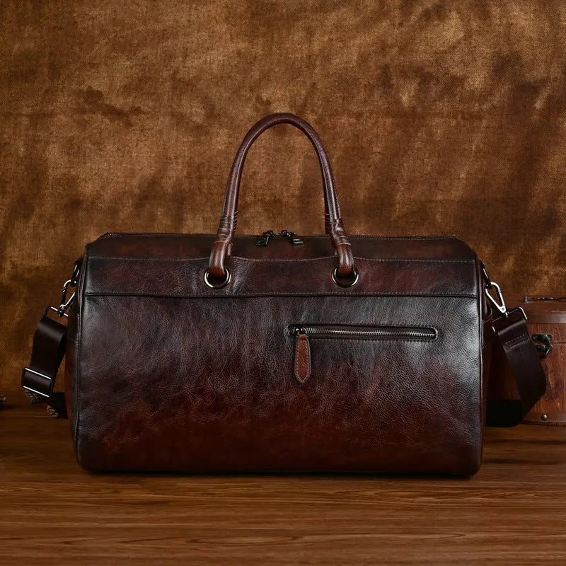 Handmade retro leather bag in vintage brown with first layer cowhide construction and below 20L capacity