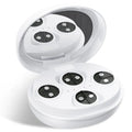White wireless red light EMS eye and face two-in-one massage device on a table.
