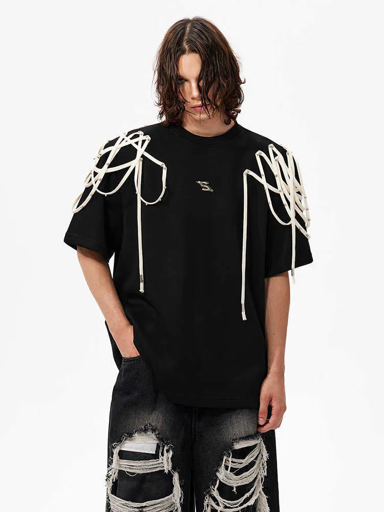 Black short-sleeved T-shirt with padded shoulders and rivet ribbon detail in loose fit style