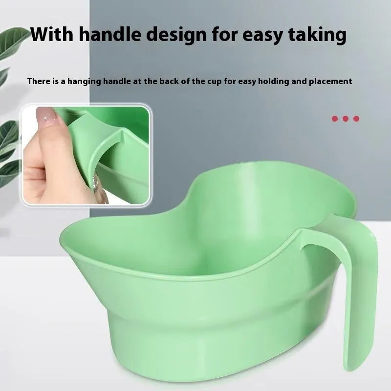 Green plastic elderly care gargle cup with a spout for bedridden patients