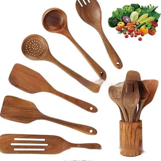 Seven-piece wooden spoon and spatula kitchen utensil set on kitchen counter