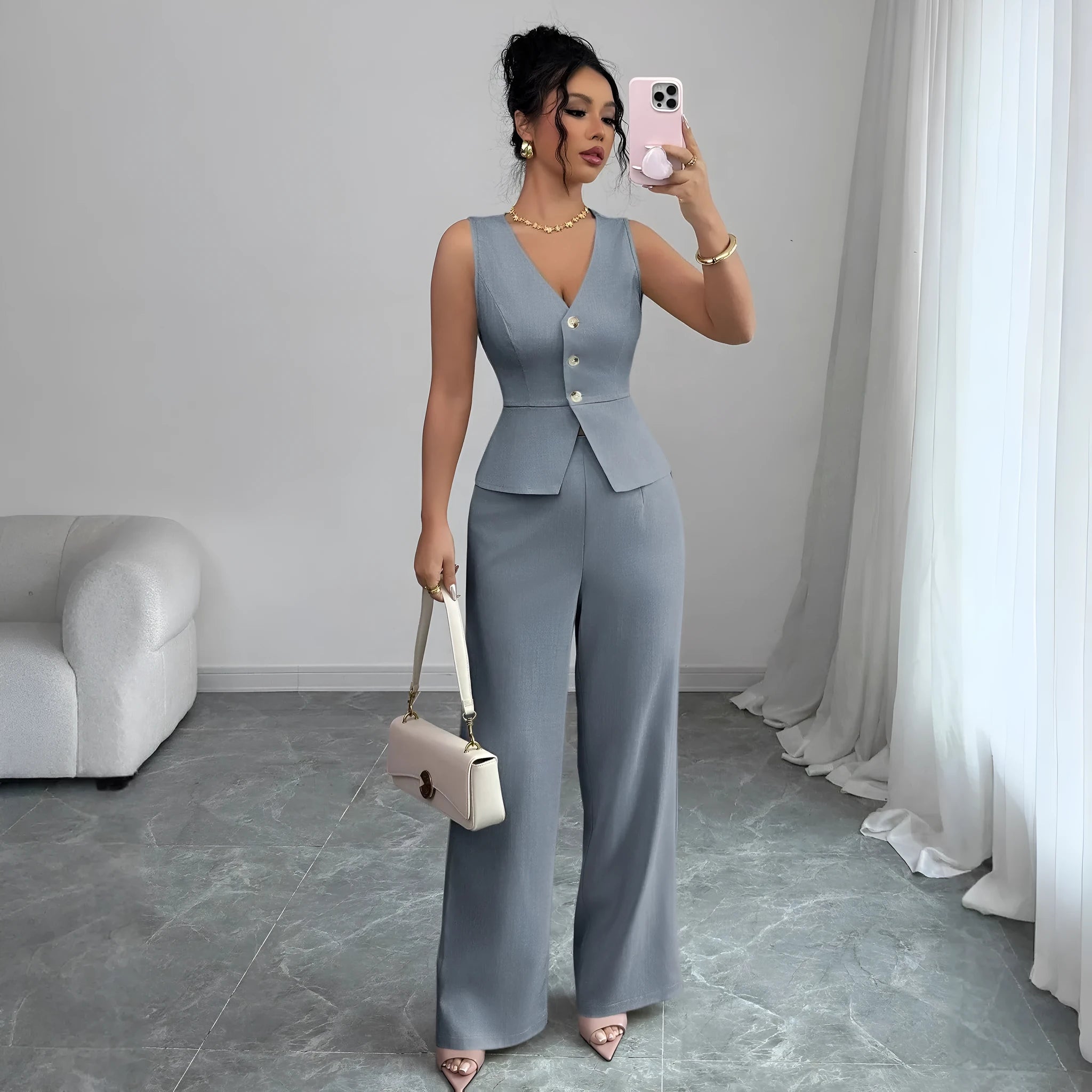 Women's solid colour sleeveless vest and high waist trousers two-piece casual set.