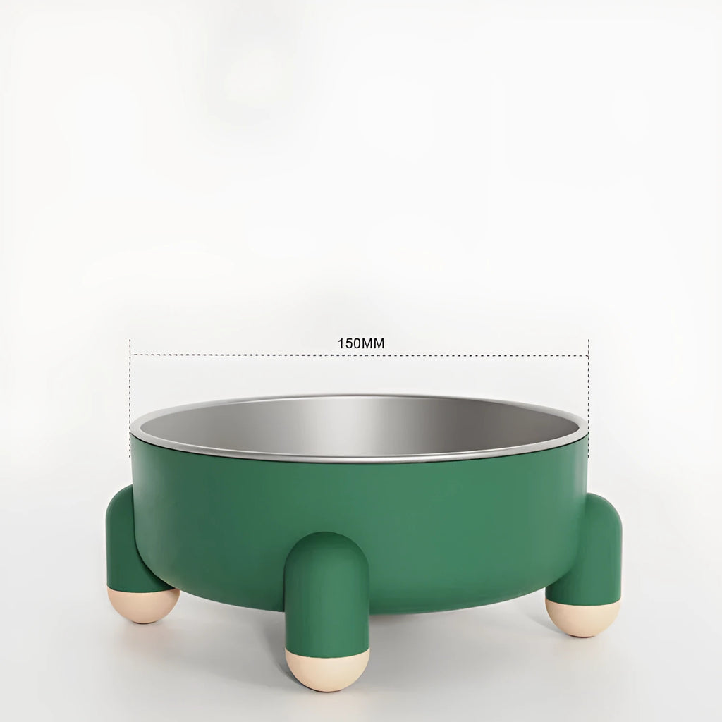 Green non-slip stainless steel pet food bowl with a high foot, shown on a floor.
