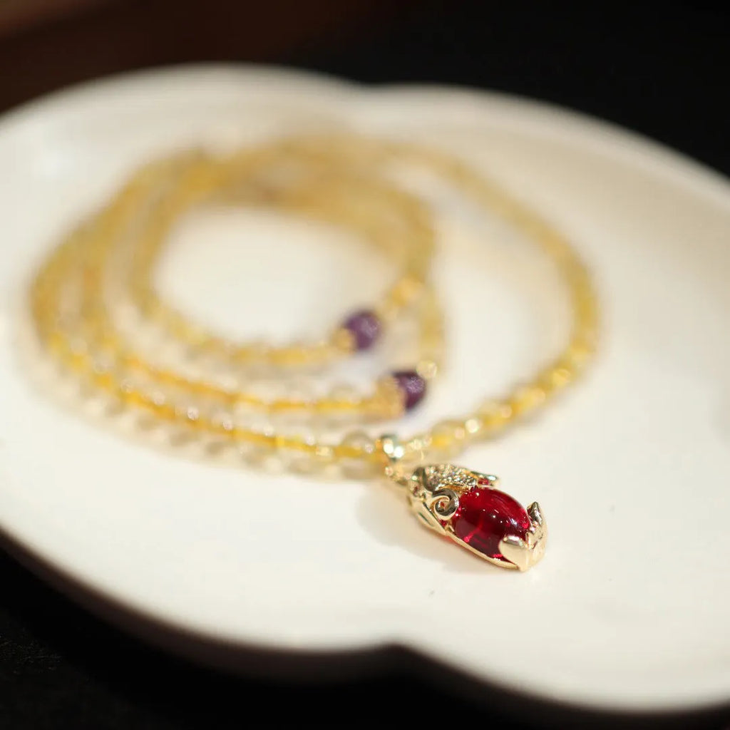 Natural Brazil gold rutilated quartz bracelet with Chinese style design and ruby quartz hanging chopsticks