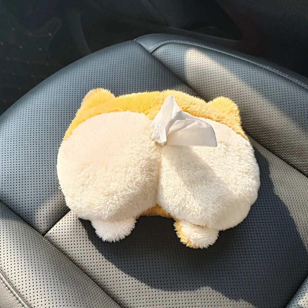 Yellow soft Corgi butt-shaped tissue box cover with elastic strap for car visor or home use.