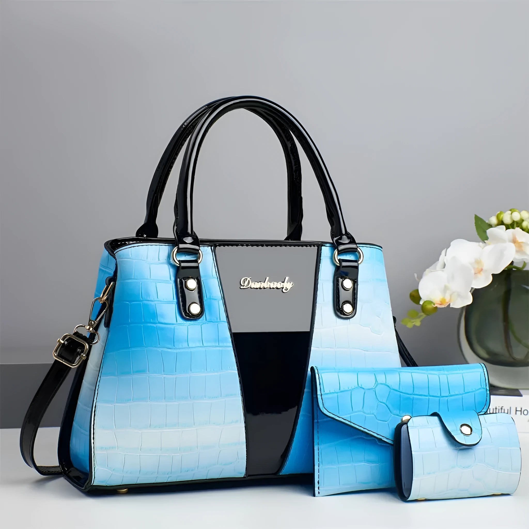 Women's crocodile stitch three-piece shoulder bag set showing main bag, small bag, and card holder in beige colour