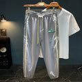 Men's black ice silk harem trousers with mid waist design and relaxed fit