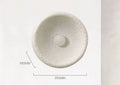 Japanese minimalist wall lamp in resin with warm light, showing three size options