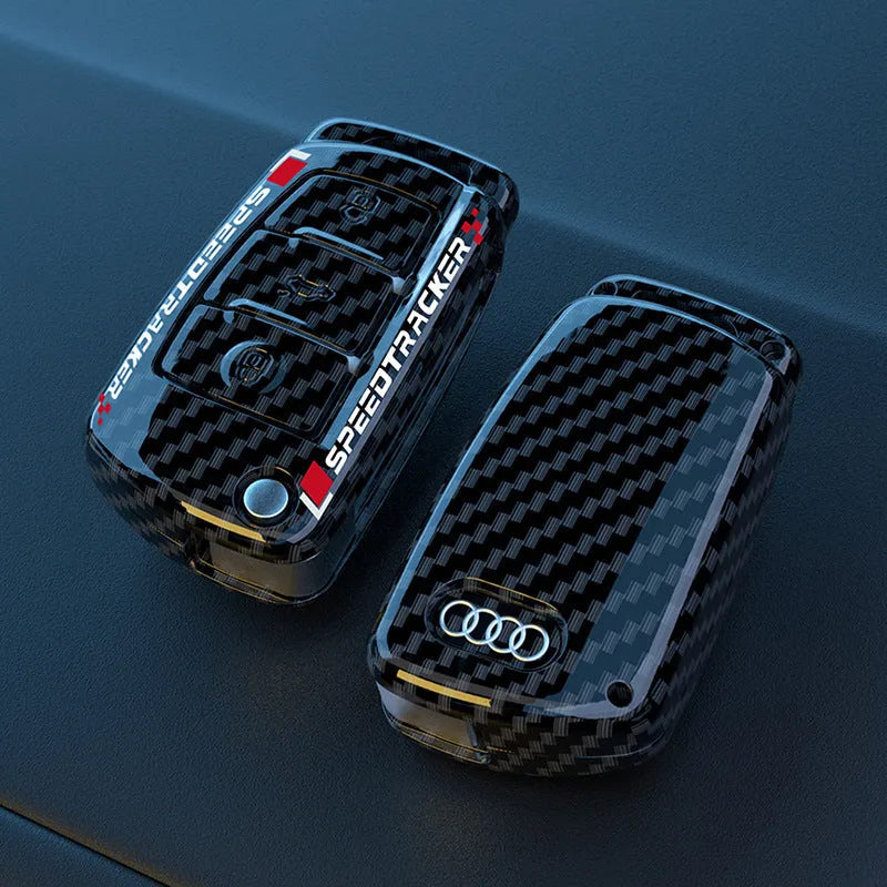 Carbon fibre style car key cover with mirror element in carbon black and white colours