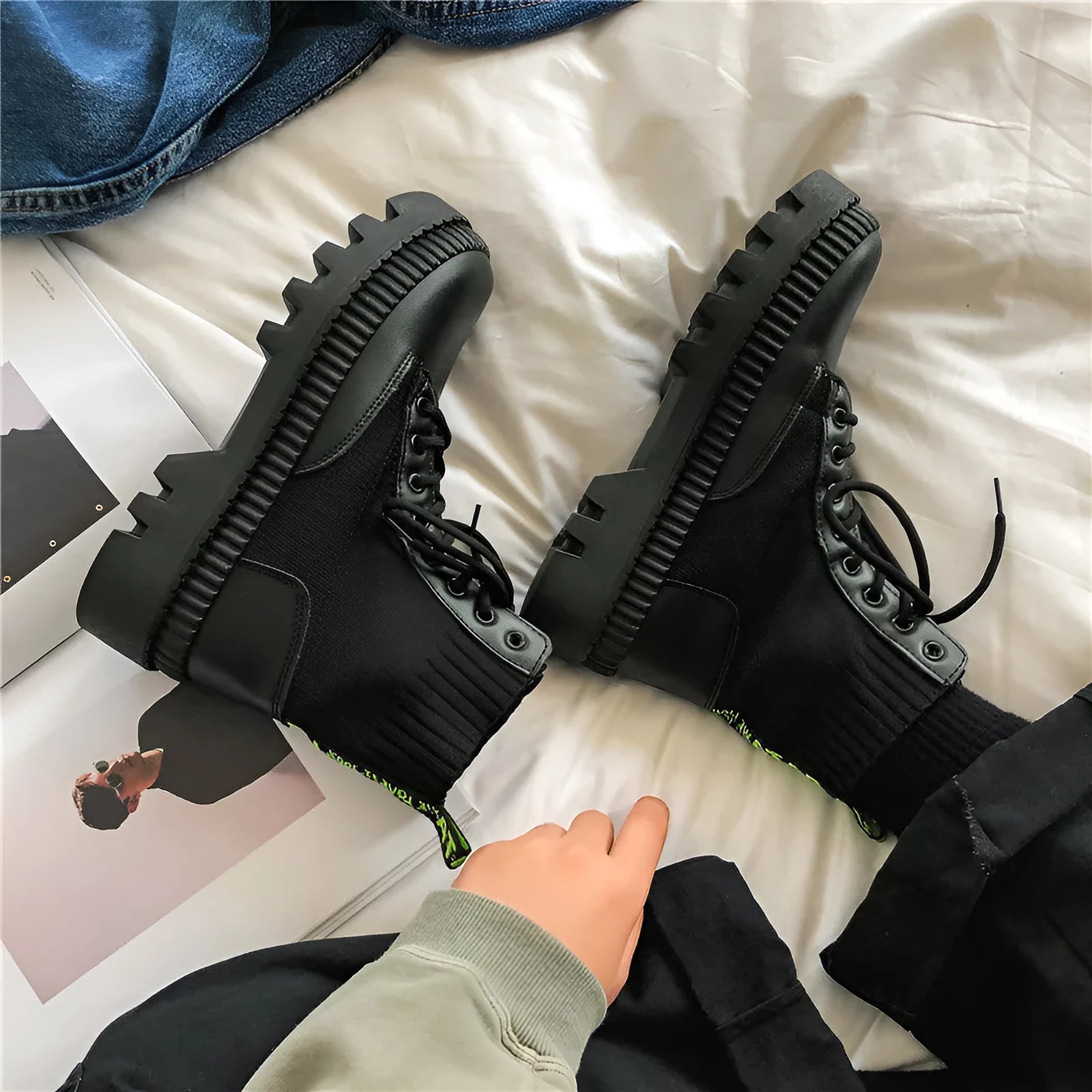 Black men's Dr Martens high-top platform combat boots with a side zip fastening.